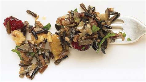 This recipe is by marian burros and takes 25 minutes. Wild Rice, Walnut, and Cranberry Dressing | Recipe ...