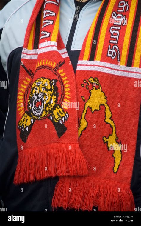 Demonstration By Tamils Man Wearing A Scarf With Tamil Tiger Symbol And