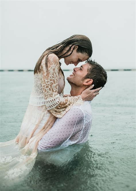 Couple Posing In The Rain Notebook Kiss Key West Wedding Photographer