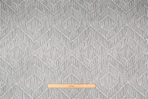 All of our tartan fabric is sold by the yard. Robert Allen Rattan Geo BK Woven Upholstery Fabric in Aloe
