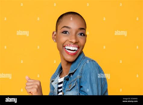 Close Up Portrait Of Cheerful Excited Smiling Young African American