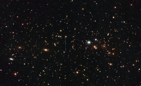 Nasa Photo From Hubble Reveals Largest Galaxy Cluster Ever Discovered