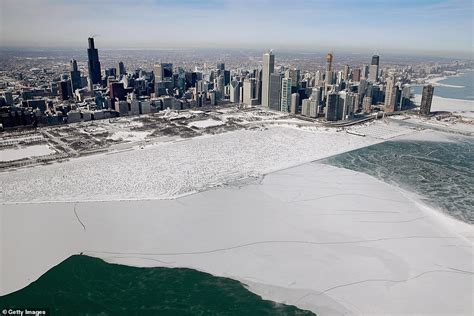 Stunning Images Of Shards Of Ice Littering Lake Michigan Surface As The