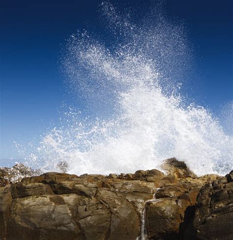 Wave Splashing Against Rocks Stock Image Image Of Crashing Rock