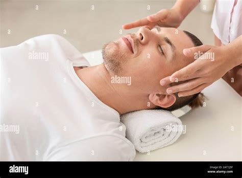 Reiki Master Working With Patient Stock Photo Alamy