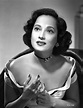 Posterazzi: Merle Oberon on an Off Shoulder Top sitting Portrait Photo ...