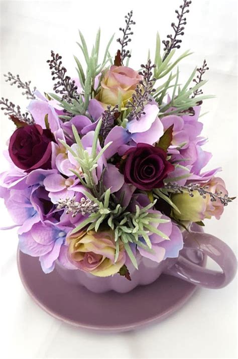 You rarely see it on general sale in florists and certainly not in. Silk Flower Arrangement - Ceramic Cup & Saucer with ...