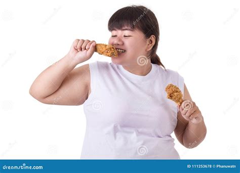 Fat Asian Woman Holding And Eating Fried Chicken Isolated On White Food And Healthcare Concept