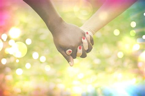 Close Up On A Mixed Race Couple Holding Hands Stock Image Image Of