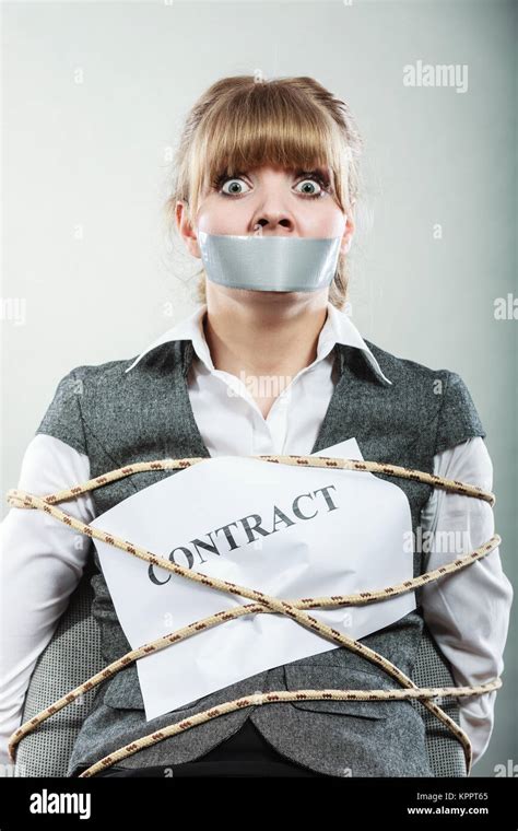 Afraid Businesswoman Bound By Contract Terms And Conditions With Mouth Taped Shut Scared Woman