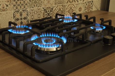 Natural Gas Burning By Blue Flames In Kitchen Stove Food Cooking