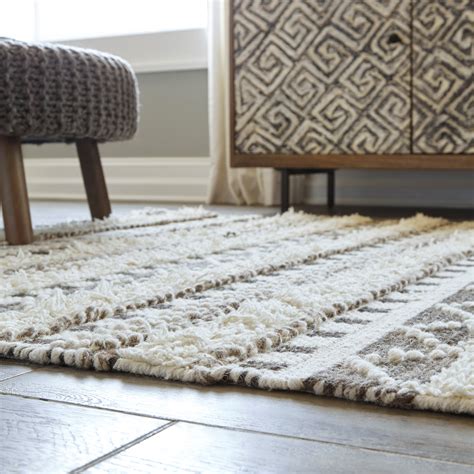 Signature Design By Ashley Contemporary Area Rugs Karalee Ivorybrown