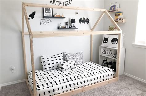 We found these free diy furniture plans by the design confidential that we modified to save money and keep the bed lower to the floor. DIY Montessori Floor House Bed {Arlo's monochrome toddler ...