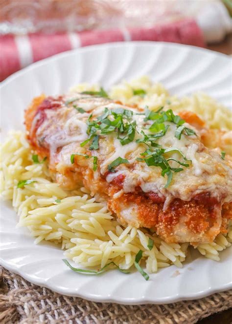 Healthy oven baked chicken parmesan is crispy on the outside and tender on the inside with no frying required. EASY Baked Chicken Parmesan Recipe (+VIDEO) | Lil' Luna