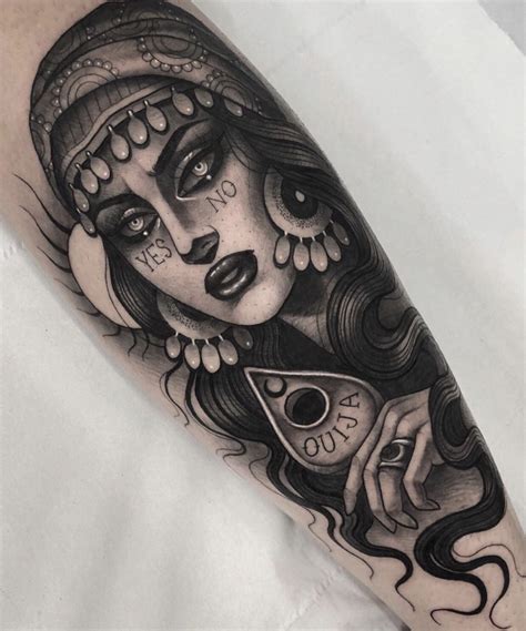 A Black And White Tattoo With A Woman Holding A Cup
