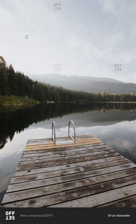 Wooden Dock On A Lake In Whistler British Columbia Canada Stock Photo