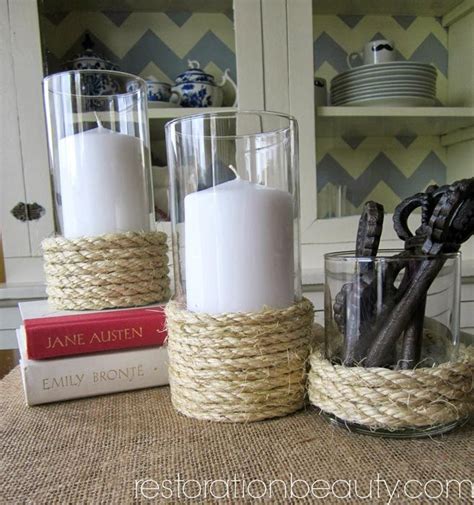 Tie a knot below each hole, for each shelf. DIY Rope Hurricane Vases (Candle Holders) | Candle vase ...