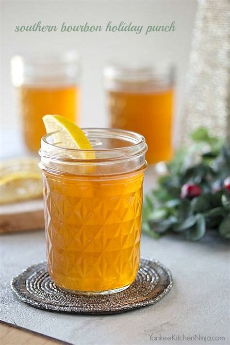In a cocktail shaker, add bourbon, simple pine syrup, bitters, and ice. Southern bourbon holiday punch | Yankee Kitchen Ninja