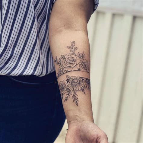 Flower Bracelet Tattoo On The Inner Forearm
