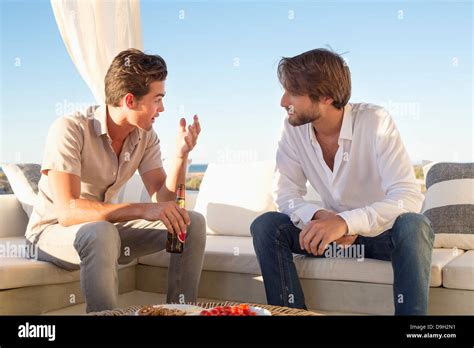 Two Friends Talking To Each Other Stock Photo Alamy