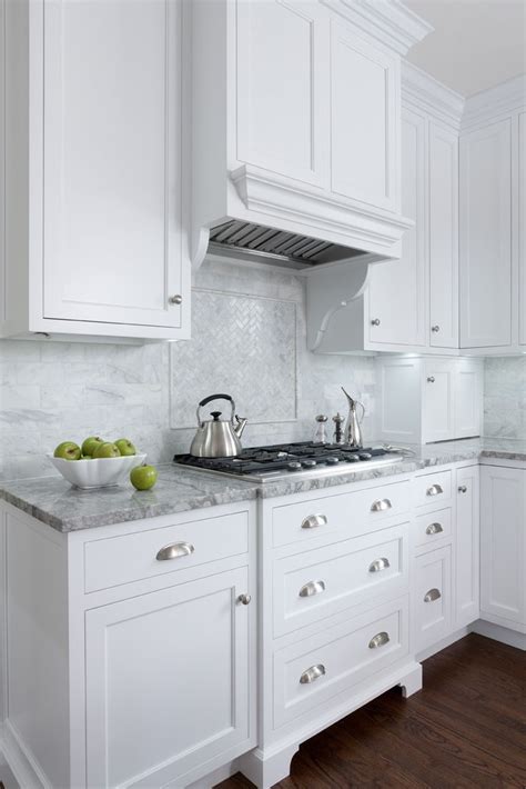 How to keep white kitchen cabinets clean: White inset cabinets, super white counters, marble ...