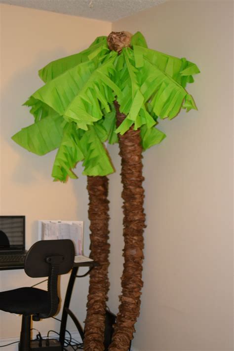 Make Your Own Palm Trees With Pool Noodles Pool Noodle Crafts Palm Tree Crafts Paper Palm Tree
