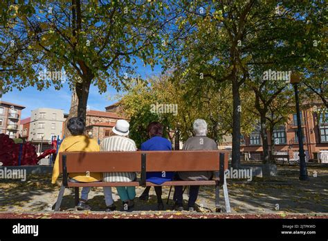 Four Older Ladies Sitting On A Park Bench In Astorga Stock Photo Alamy