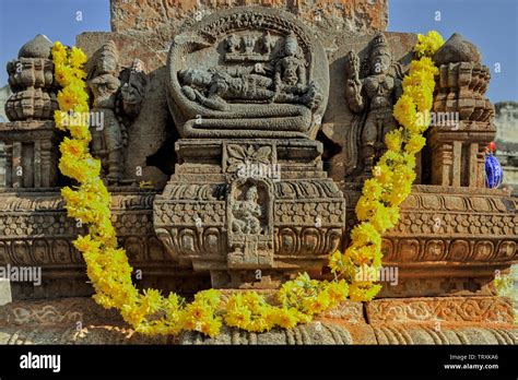 13 Oct 2009 Reclining Lord Vishnu On Stone Carved Tulsi Vrinda At