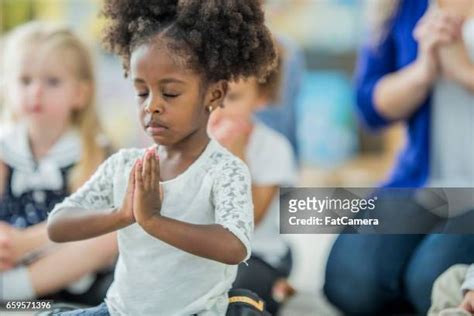 Black Child Praying Photos And Premium High Res Pictures Getty Images