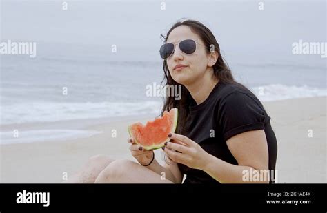 beautiful girl has fun on the beach at the oceanfront summer holiday stock video footage alamy