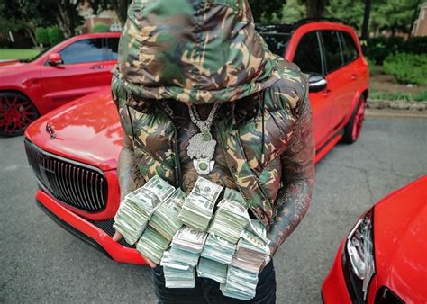 Moneybagg Yo Displays His Luxurious Collection Of Red Cars For His 30th