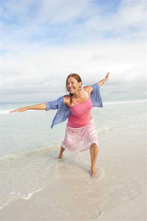 Woman Mature Beach Up Pink Stock Photos Free Royalty Free Stock Photos From Dreamstime