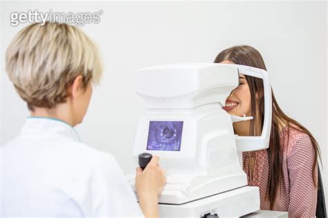 Slit Lamp Eye Control With The Ophthalmologist Handsome Man During A