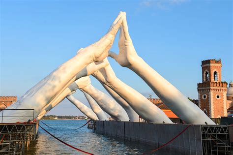 A Jaw Dropping New Sculpture Of Human Hands Has Been Unveiled In Venice