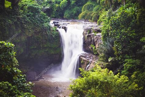 The Tegenungan Waterfall Stock Photo By ©dislentev 86640522