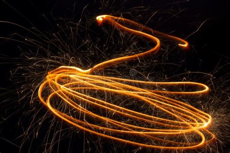 Sparks Of Sparkler In Motion At Long Exposure Stock Photo Image Of