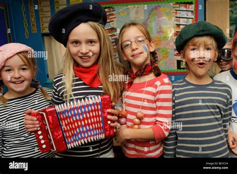 Young Pupils Dressed In French National Costumes For International Day