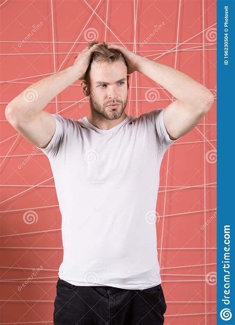 Man With Bristle On Strict Concentrated Face Pink Background