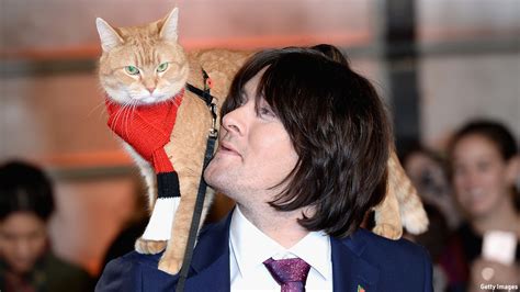 'a street cat named bob' out and about in london in march 2012credit: 10 Things You Need to Know This Week - November 14 - 20 ...