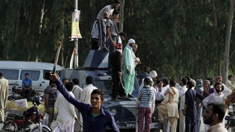 Pakistan Islamabad Police Clash With Qadri Supporters Bbc News