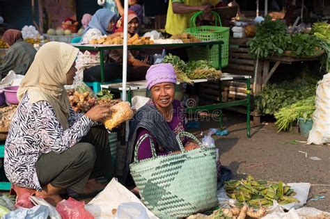 Woman Selling Fruit And Vegetables In Wet Market Near Borobudur Temple Java Indonesia