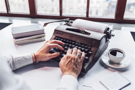 Young Writer Typing On A Retro Typewriter Stock Photo Image Of Desk