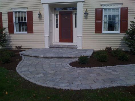 Color additives, surface polishes, stamps, and engraving are all new ways to show off color matching across garden walls, gazebo construction, and walkways allows the simple landscaping to take a front row seat to aesthetic. Stone Front Porch Turning Walkway Landscape Authority ...