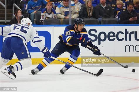 Brayden Schenn Of The St Louis Blues Controls The Puck Against The