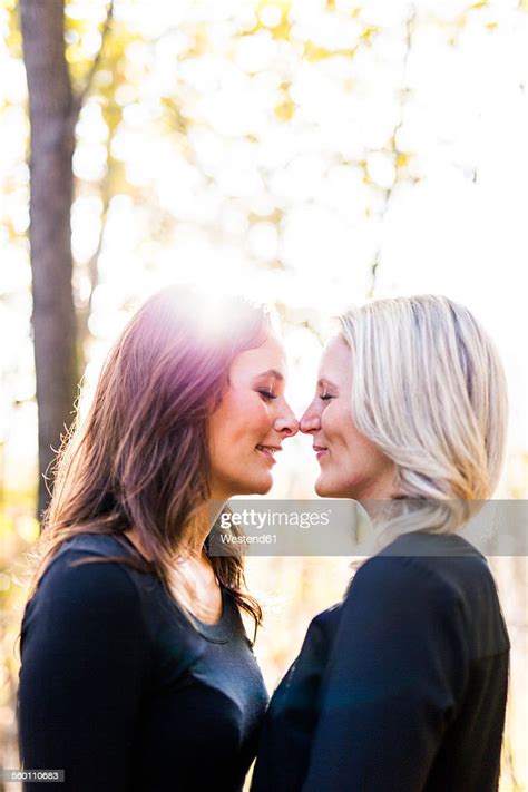 Lesbian Couple Rubbing Noses Photo Getty Images