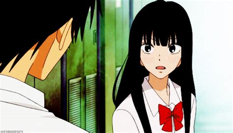 An Anime Character With Long Black Hair And Red Bow Tie Standing Next