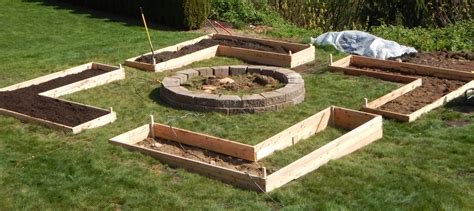 Raised beds improve drainage and allow aeration at the root level. Our Backyard Raised Vegetable Garden | The Urban Hearth