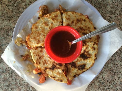 The restaurant's reputation beckons to burrito lovers even from across. La Azteca Tortilleria Chicharonnes Quesadilla