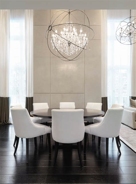 Choosing marble flooring might help you to get a more luxurious look even without a rug. Dining Room Ideas by Kelly Hoppen | Modern Dining Tables