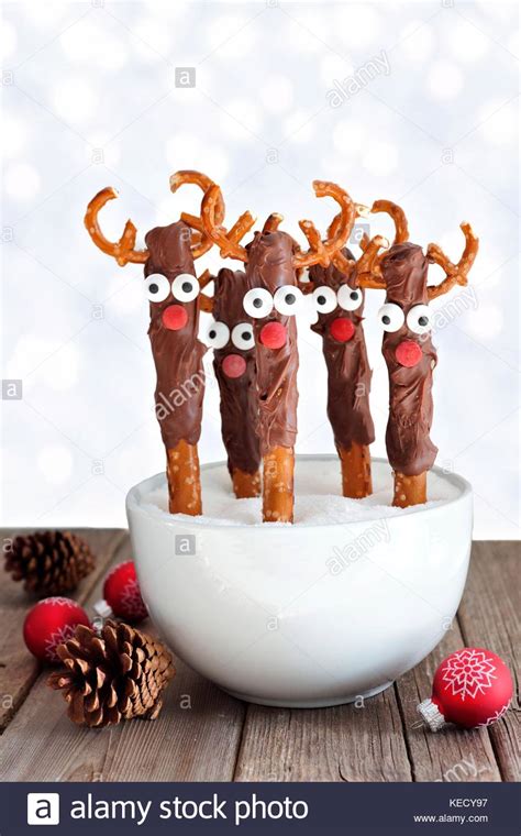 Fun Christmas Reindeer Chocolate Dipped Pretzel Rods In A Bowl With A